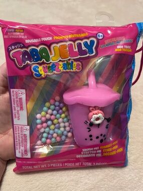Pink Squeezable Drink Toy with Charm